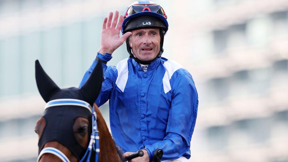 Dane O'Neill waves to the crowd after Danyah wins Al Quoz Sprint